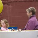 Grammy and Amber take the teacups for a spin